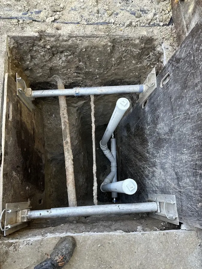 Experienced plumber completing Drain Cleaning work in Belmont